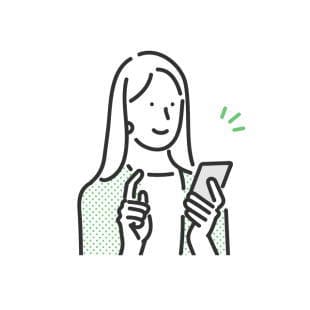 スマホでピラティスの繰り越しをしている女性